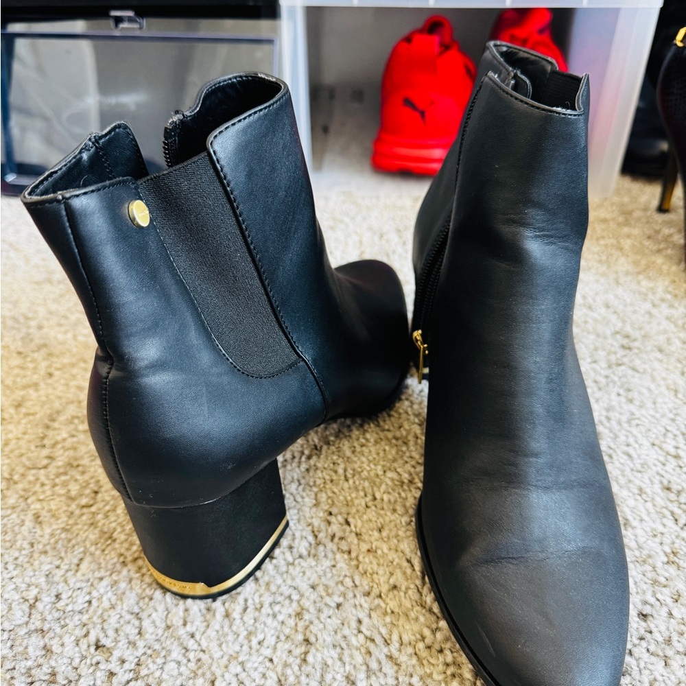 Calvin Klein Black Ankle Booties with Gold Accent